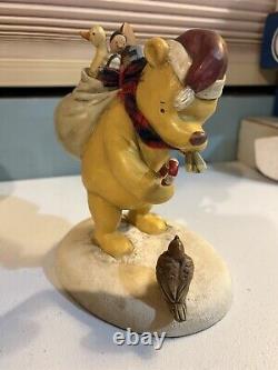 Disney Winnie the Pooh as Santa figurine, about 7 inches
