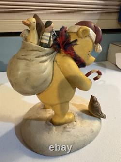 Disney Winnie the Pooh as Santa figurine, about 7 inches