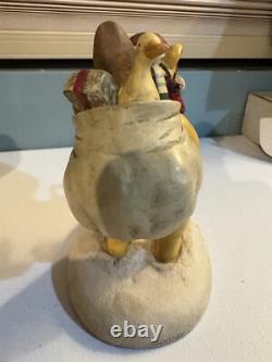 Disney Winnie the Pooh as Santa figurine, about 7 inches