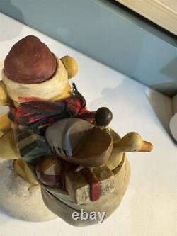 Disney Winnie the Pooh as Santa figurine, about 7 inches