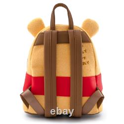 Loungefly Winnie the Pooh Bear Honey Tummy Mini Backpack New. In hand