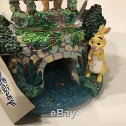 Retired Disney Winnie the Pooh Playing Poohsticks Musical Snow Globe With Tag