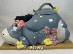 Disney -Vintage- Figurine de boîte à biscuits Eeyore avec fleurs - Années 1990 en bon état