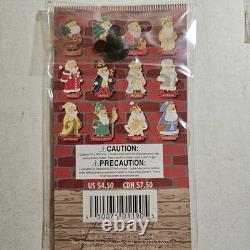 Disney Winnie l’Ourson Père Noël des pays autour du monde lot de 12 pins neufs