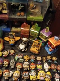 Énorme lot de Disney Doorables avec plus de 200 figurines, playsets, voitures, variantes rares