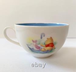 Ensemble de théière Winnie l'Ourson (4,33x4,72)/Tasse2 (3,54x2,16)/Soucoupe2 (5,7) Pooh Ensemble de théière Winnie l'Ourson (4,33x4,72)/Tasse2 (3,54x2,16)/Soucoupe2 (5,7) Pooh