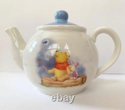 Ensemble de théière Winnie l'Ourson (4,33x4,72)/Tasse2 (3,54x2,16)/Soucoupe2 (5,7) Pooh