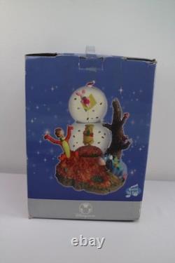 Le cerf-volant de Winnie l’Ourson, double problème, Disney Store, nouveau globe musical à neige à deux niveaux