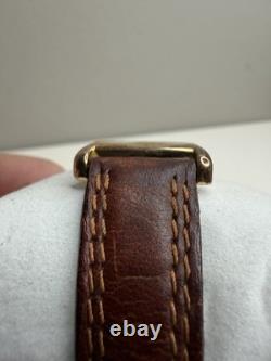 Montre Tank vintage Timex Disney Winnie l’ourson dorée avec bracelet en cuir