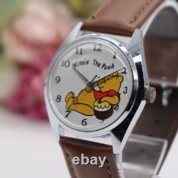 SEIKO Disney Time Winnie l’Ourson à remontage manuel 5000 6030 SS 34,5 mm années 1970